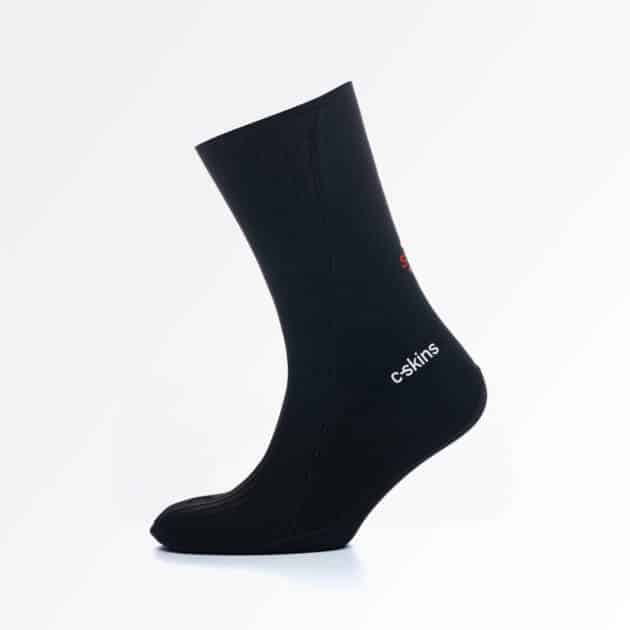 A single Cskins Swim Research 3mm GBS Sock in black stands upright with the brand name in white near the ankle, set against a plain white background.