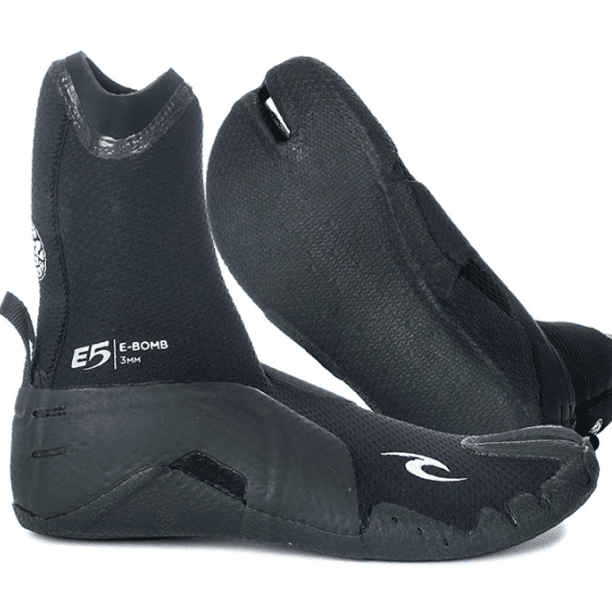 A pair of Rip Curl E-bomb 3mm Split Toe Boots in black neoprene, featuring textured soles, ankle-high design, "E5 E-Bomb 3MM" branding on the side, and a white logo on the toe.