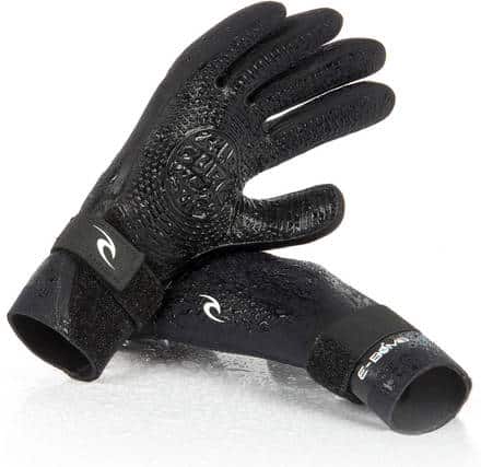 The Ripcurl E-Bomb 2mm Gloves are black neoprene wetsuit gloves featuring textured palms for grip and adjustable wrist straps, shown against a white background.