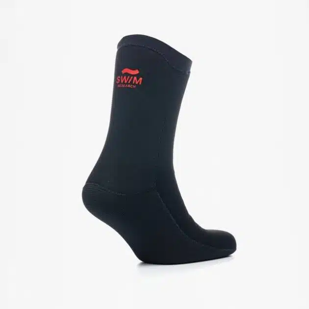 The C-Skins Swim Research Freedom 4mm Swim Sock is shown in black neoprene with a red wave logo and "SWIM RESEARCH" near the top, set against a plain white background—ideal for those seeking premium swim socks.